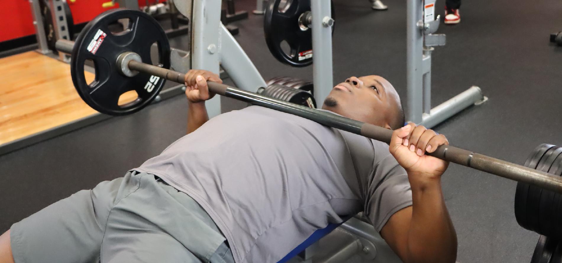 Broward student working out on the bench press